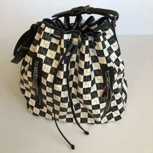 L.A.M.B. checkered bucket bag